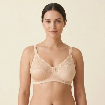 SilkeSoft nude floral lace full coverage wire-free bra featuring breathable fabric, non-padded cups, adjustable straps, and elegant floral embroidery for everyday comfort.
